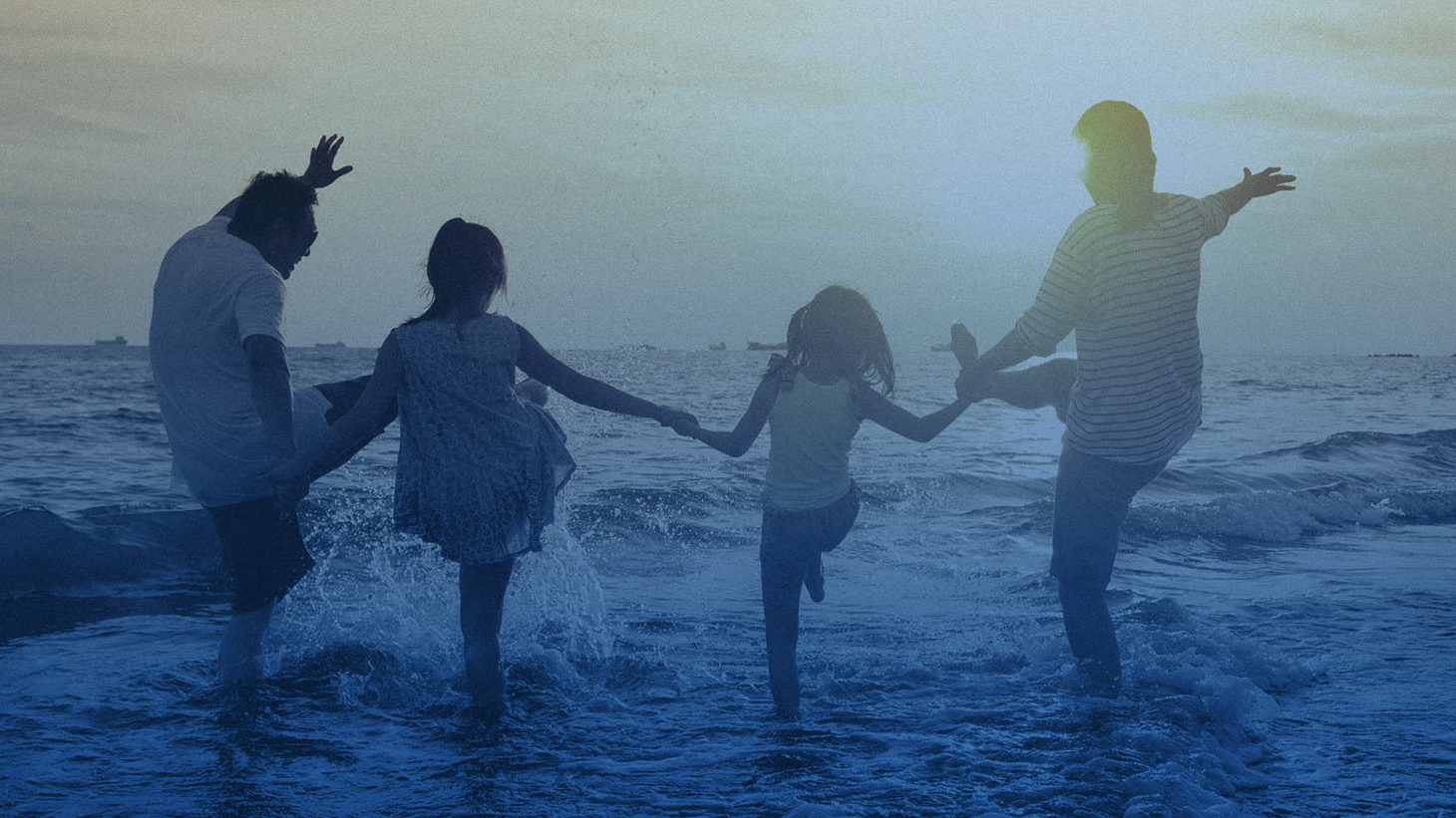 Family Playing on the Beach